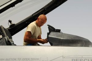 Edmonds working on an F-16 in Afghanistan