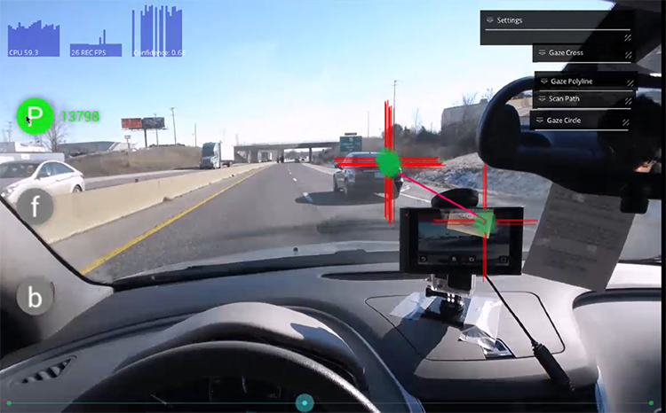 Image of highway from driver's point of view and with alert system in use