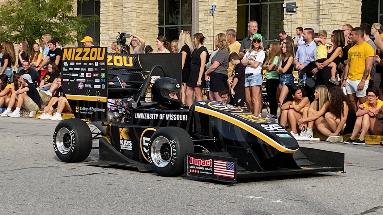 Formula car at the Homecoming Parade