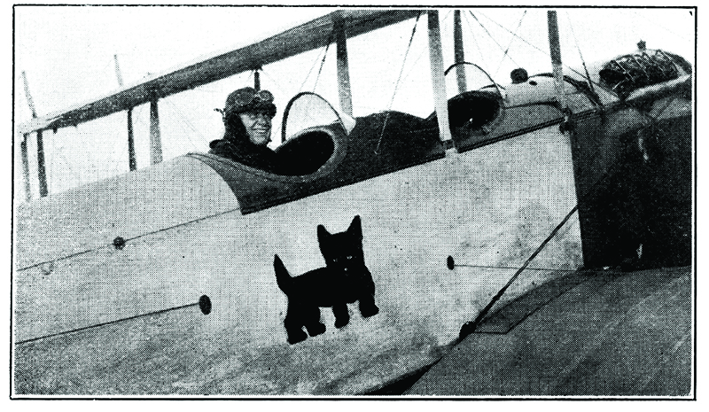 Historic photo of man in plane.