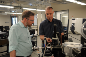 Derek Anderson and Matt Maschmann in a lab