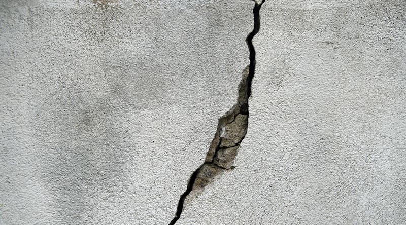 Cracked concrete wall