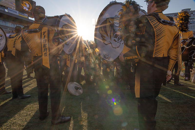 Photo of Marching Mizzou members with drums outside