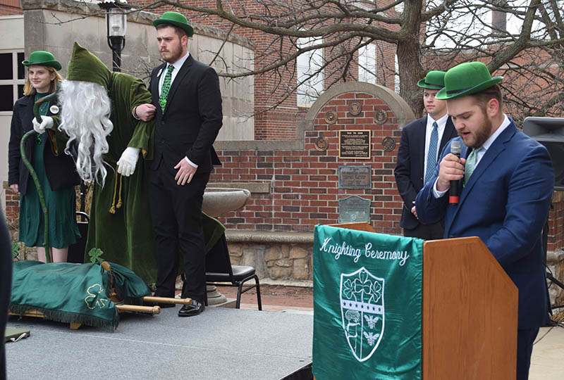Students and St. Patrick at the Knighting Ceremony