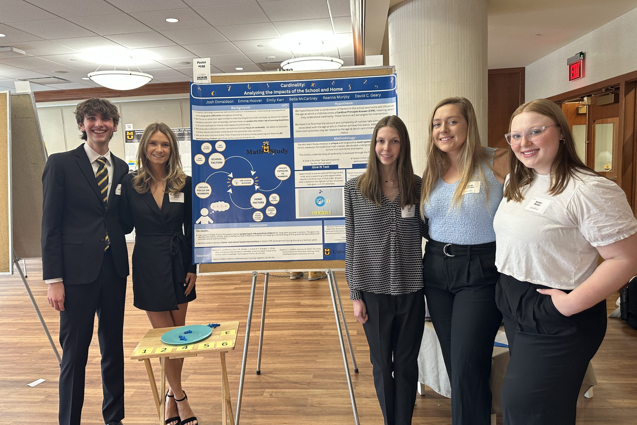students presenting at Show me research week - BE