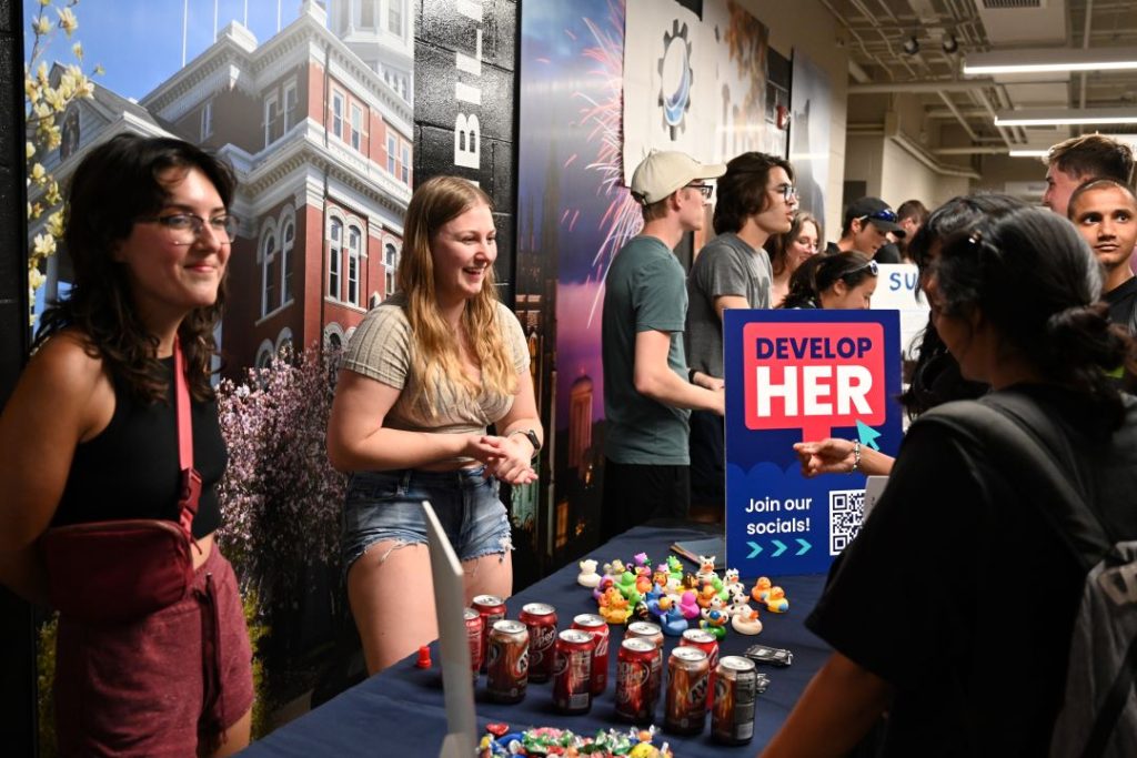 The DevelopHER booth at the BBQ