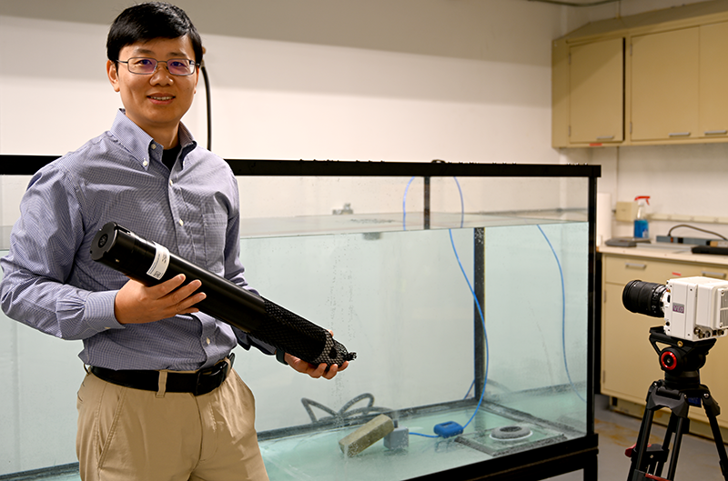 In his lab, Binbin Wang mimics natural seeps on the bottom of the ocean floor