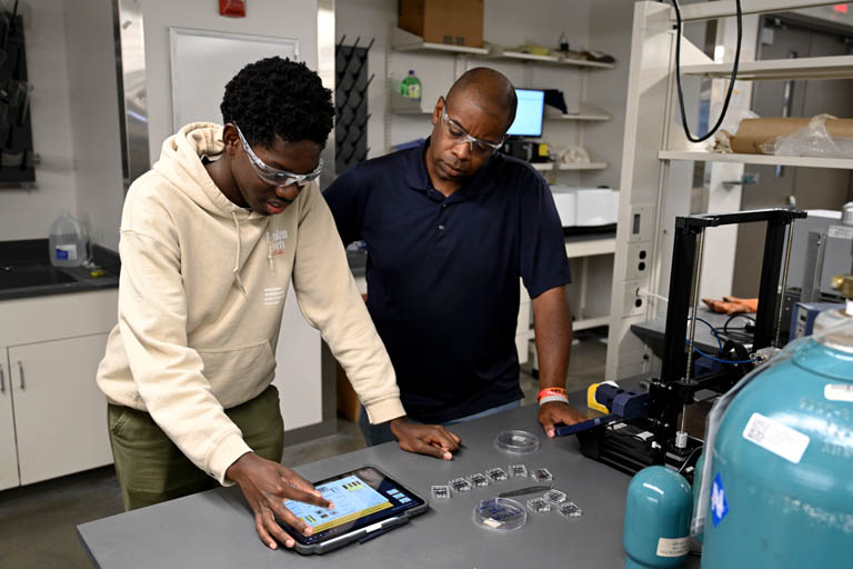 Rogers with student at one of Mizzou Engineering's NSF REUs