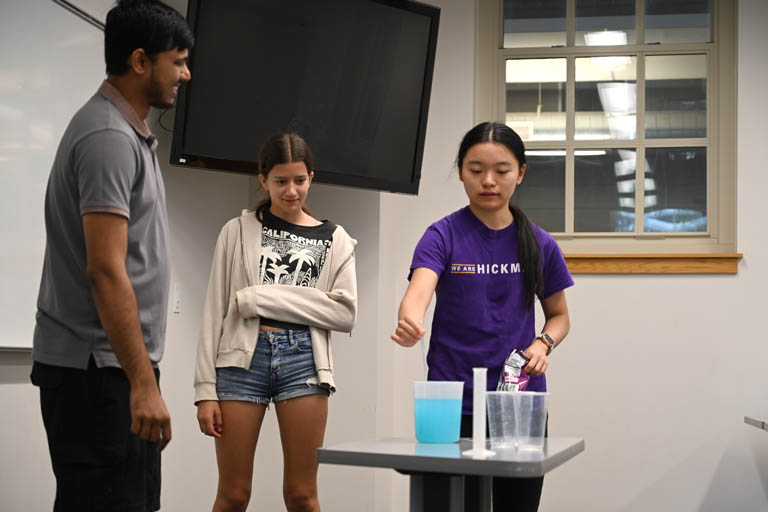 Girls experiencing environmental engineering camp activity