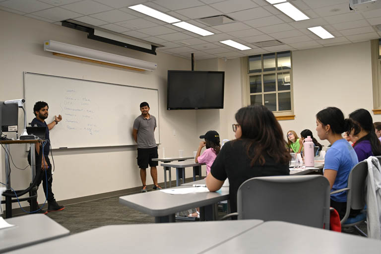 Girls experiencing environmental engineering camp lecture