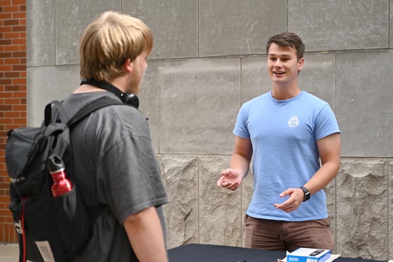 Two students at New Student BBQ