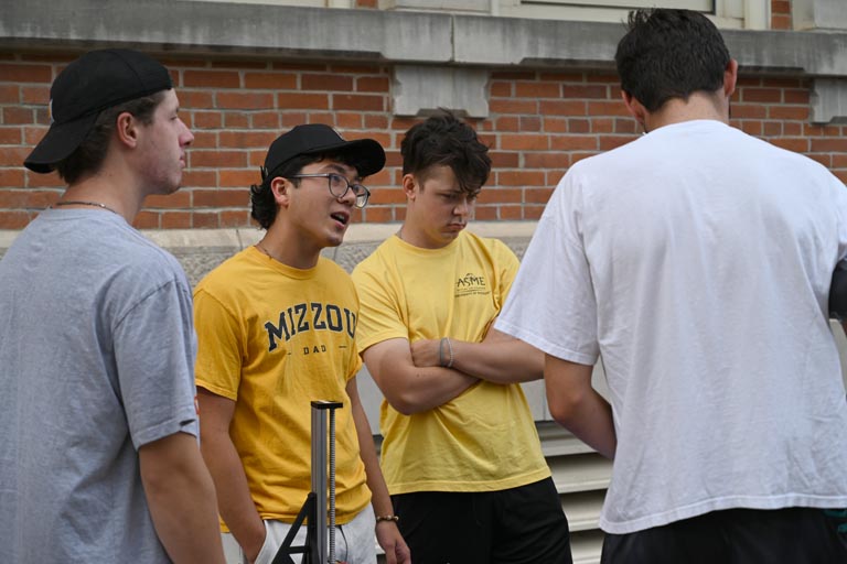 Four students at New Student BBQ