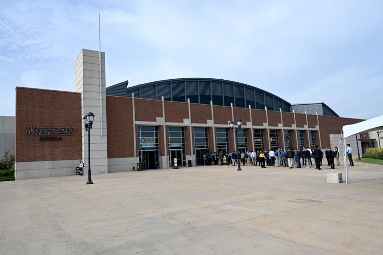 Mizzou Arena with line of students waiting for fair entry