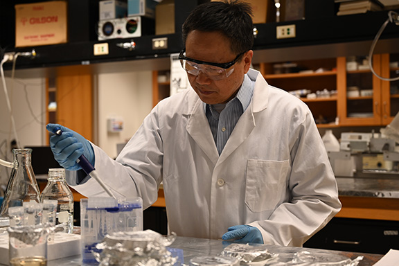 Photo of a researcher in a lab