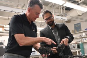 Bill Buttlar and Punya Rath examine rubber-modified asphalt in the Mizzou Asphalt Pavement and Innovation Lab in Lafferre Hall.