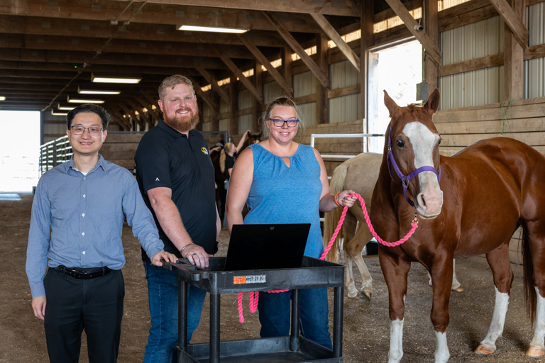 Jian Lin, Morgan Miller, Marcy Crosby and a horse