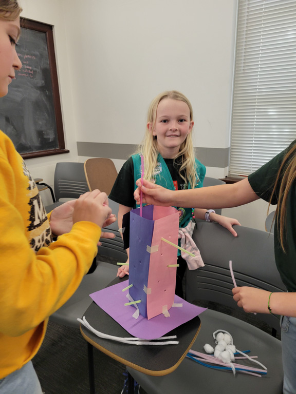 Girl with tower at Girl Scout Day 2024