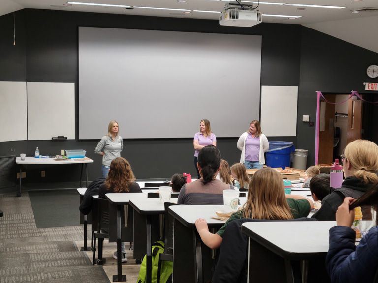 speakers presenting at Girl Scout Day 2024