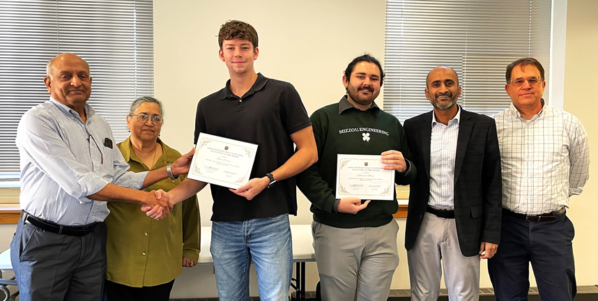 From left: Dr. Vellore Gopalaratnam, Anantha Gopalaratnam, scholarship recipients John Powell and Michael Mann, CEE chair Praveen Edara and scholarship committee chair Brent Rosenblad