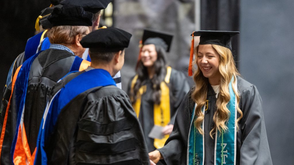 Graduate receives her diploma