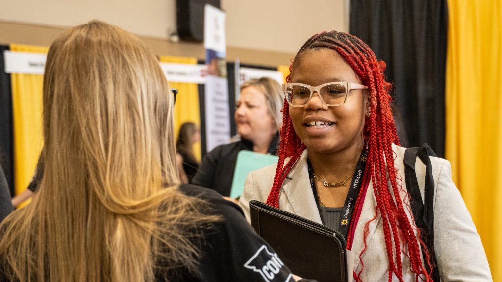 A Mizzou Engineering student engages with a company representative at the spring 2026 career fair.