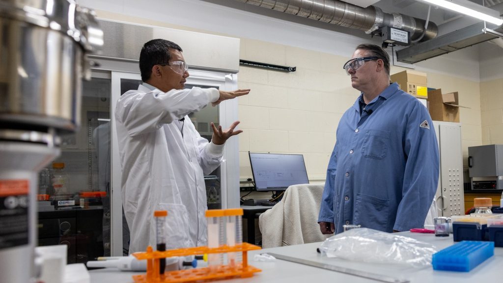 Gary Baker and Zhongyu Yang in the lab