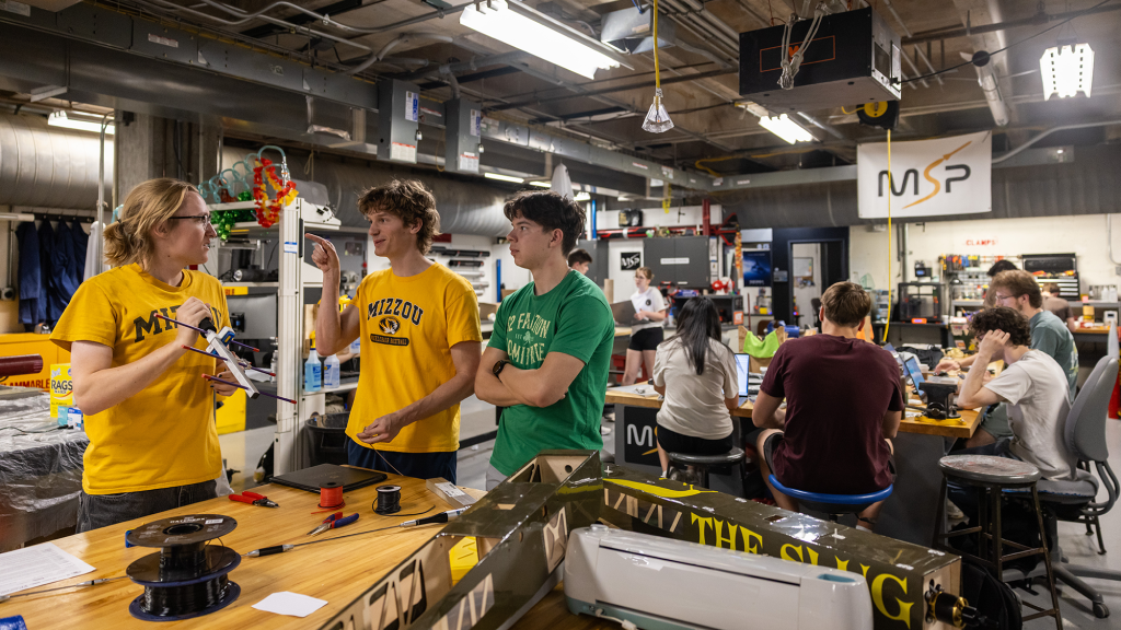 Students in the Mizzou Space Program in their workshop
