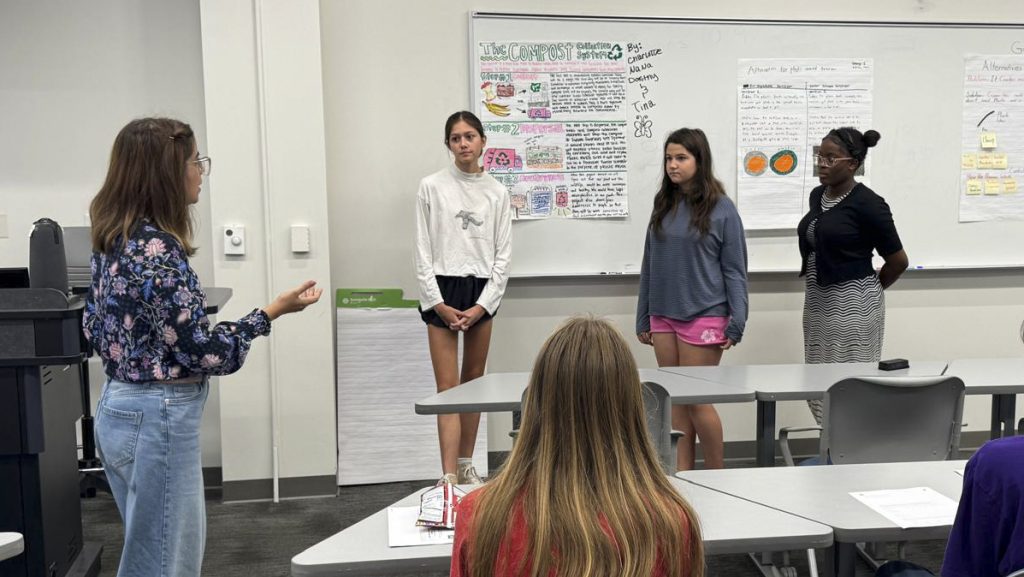 Maryam Salehi instructs young women in classroom