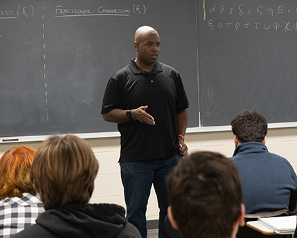 Reg Rogers teaches a class