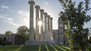 Afternoon sunlight streams through the Columns